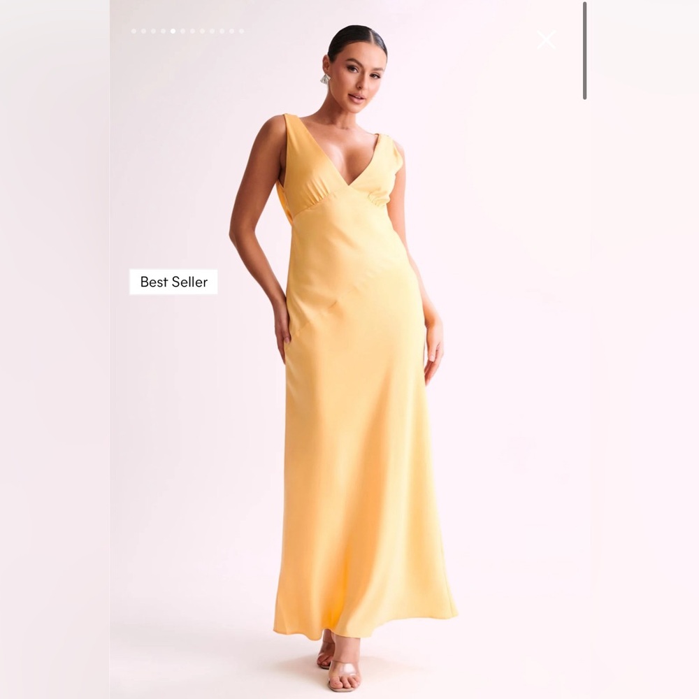 Brand new yellow statin maxi dress